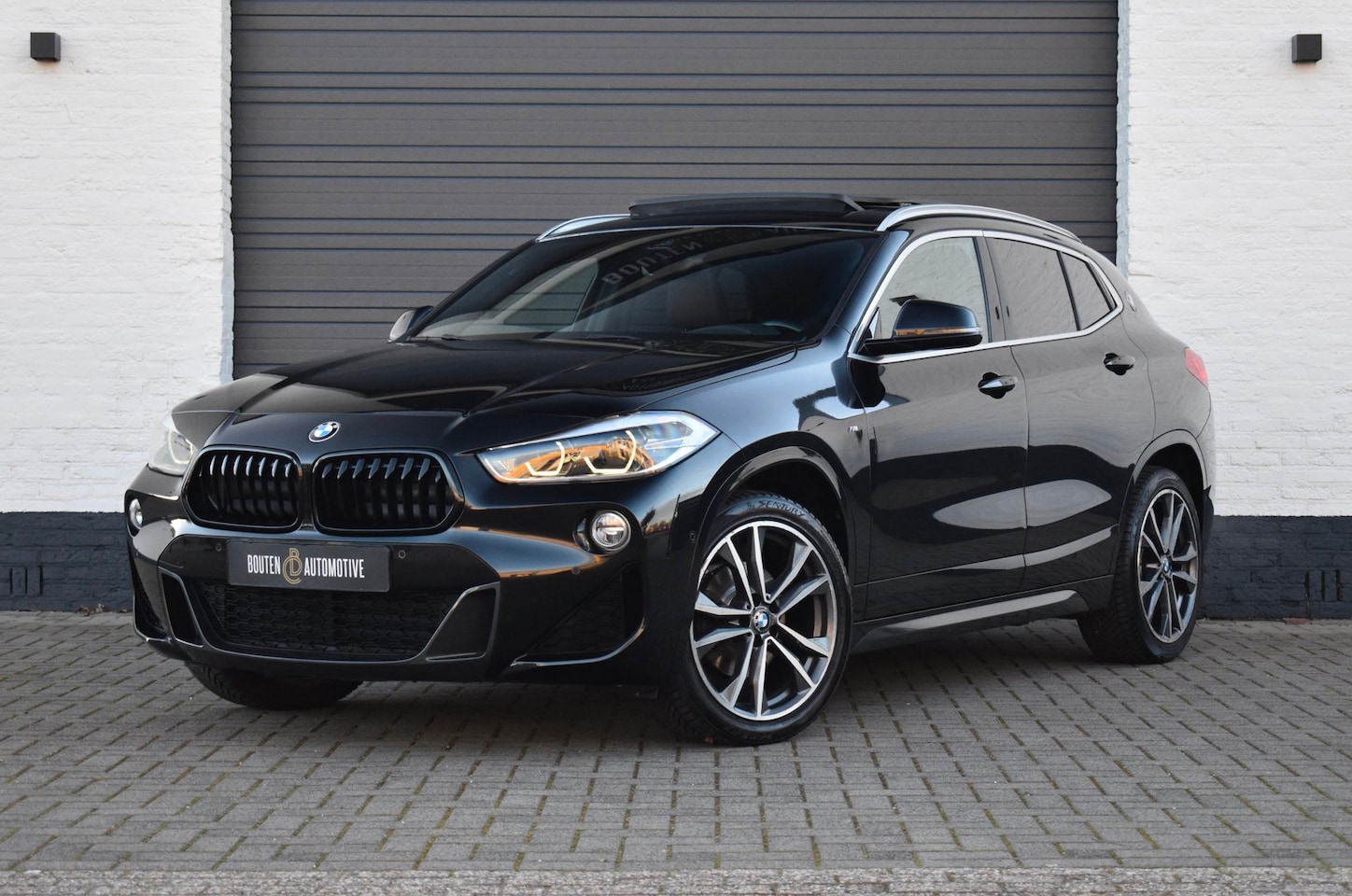 BMW X2 - SDrive18i Executive M-Sport | Pano | LPG | - AutoWereld.nl