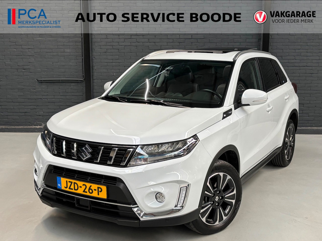 Suzuki Vitara - 1.5 Hybrid HEV Style automaat - schuif-/kanteldak - camera - AutoWereld.nl