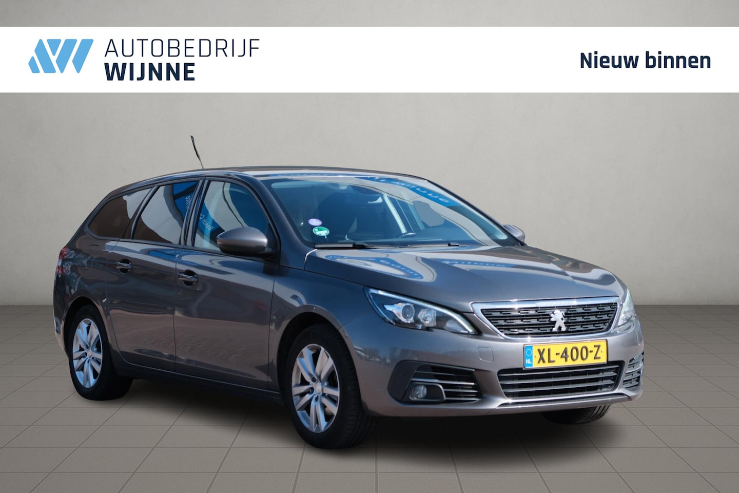 Peugeot 308 SW - 1.2 PureTech 130pk Allure | Navi | Cruise | Trekhaak | Climate | PDC - AutoWereld.nl