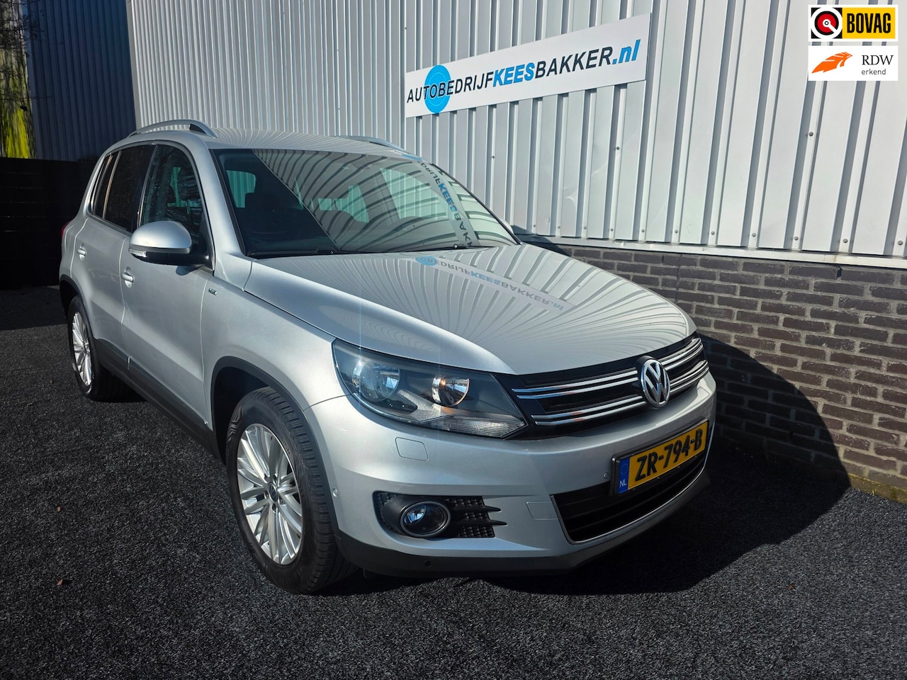 Volkswagen Tiguan - 1.4 TSI Sport&Style, Trekhaak, Cruisecontrole - AutoWereld.nl