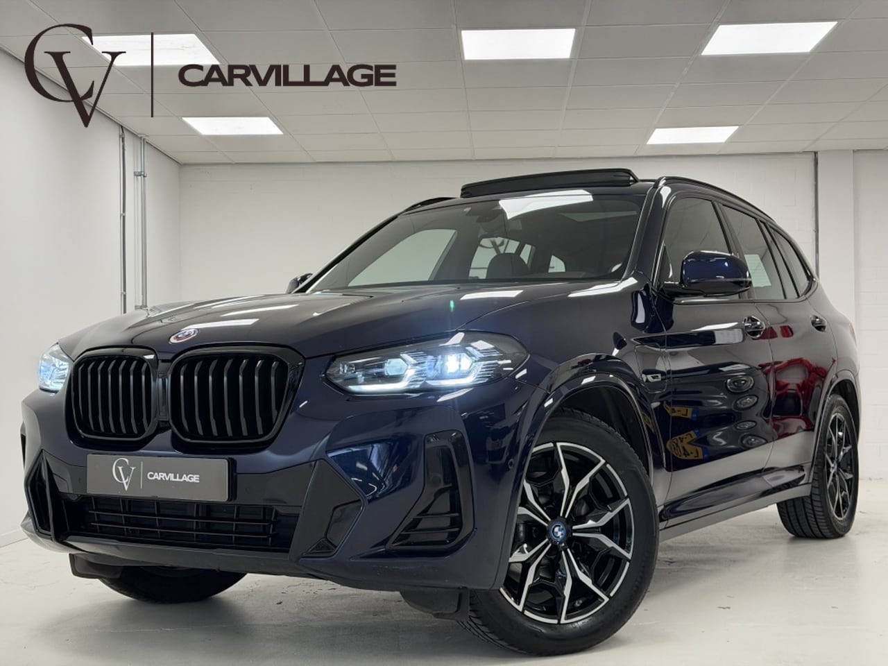 BMW X3 - xDrive30e High Executive | Panoramadak | Memory | Tansanitblau | - AutoWereld.nl