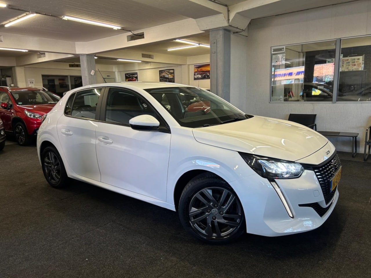 Peugeot 208 - 1.2 PT Active Pack*Carplay*NAVI*Cruise*2021 - AutoWereld.nl