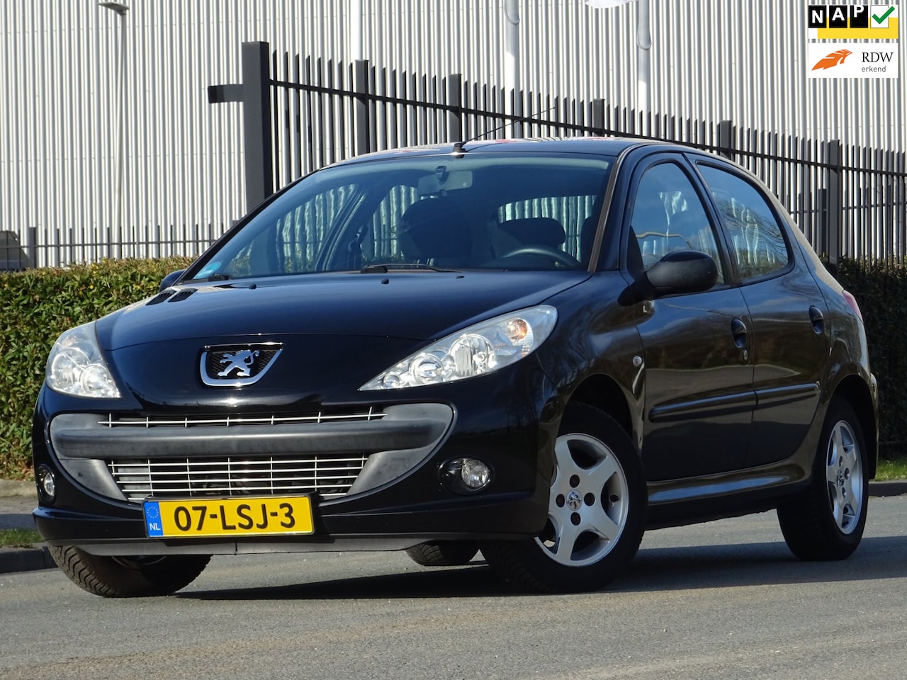 Peugeot 206 - 1.4 XS BJ2010 5DRS NAP/AIRCO/NW APK - AutoWereld.nl