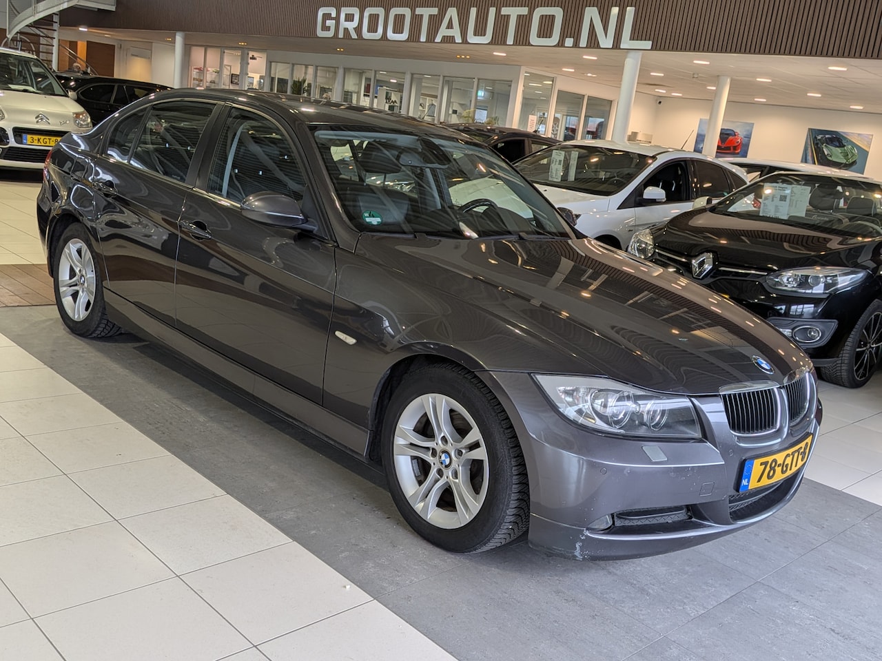 BMW 3-serie - 318i Business Line Airco, Cruise Control, Leder, Stuurbekrachtiging - AutoWereld.nl