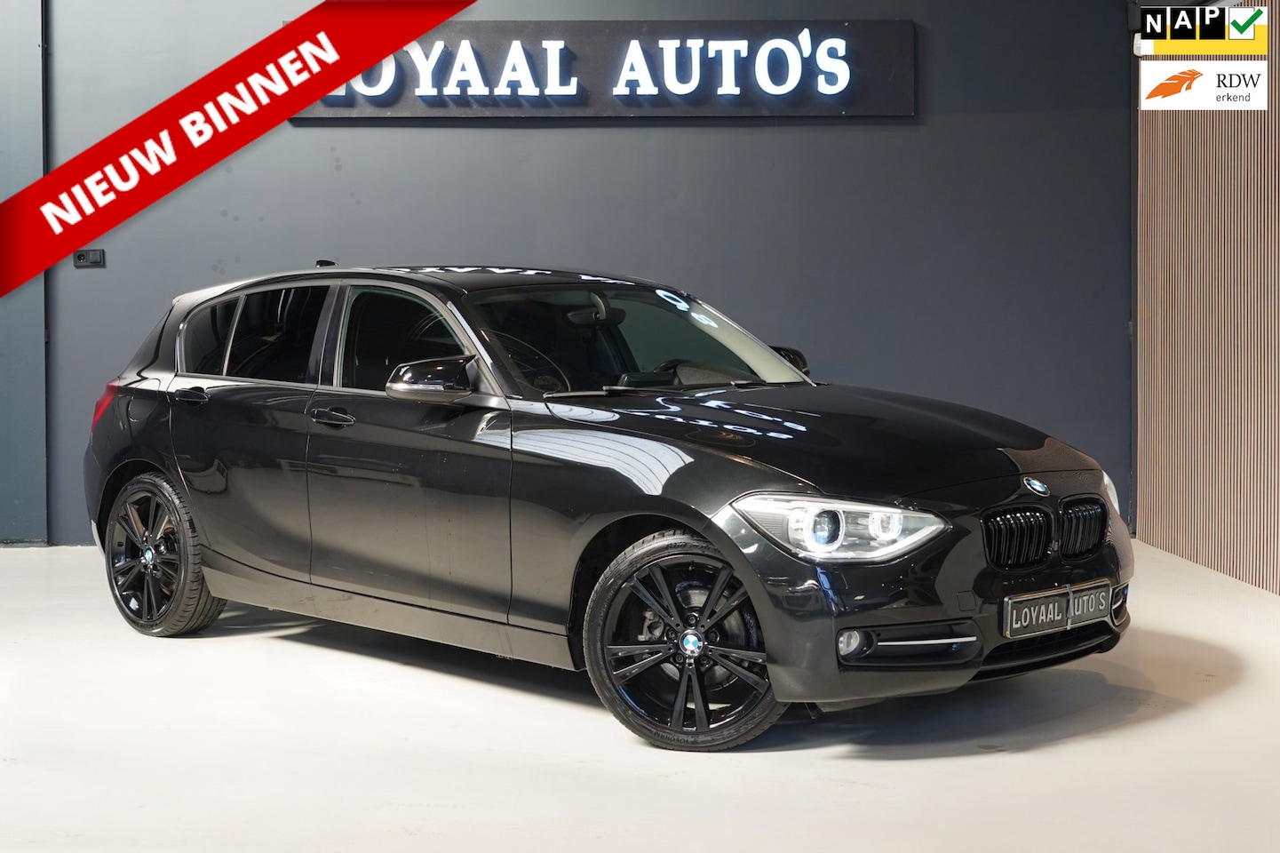 BMW 1-serie - 116i Business Line Sport | AUTOMAAT | XENON | AIRCO | PDC | ELEK.RAMEN | NAP |APK. - AutoWereld.nl