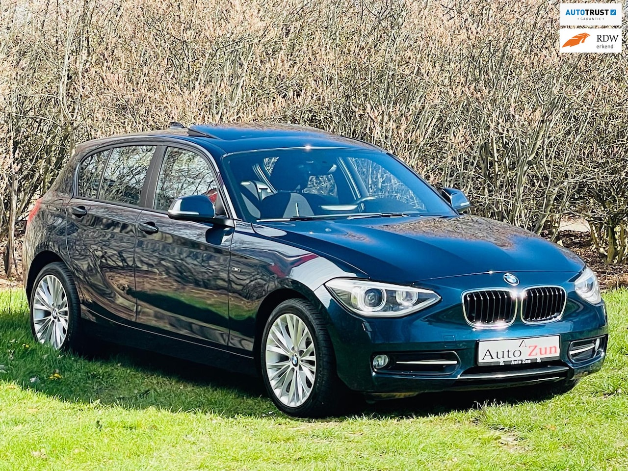 BMW 1-serie - 116i High Executive Sports/Automaat/Pano/Navi/Alcantara - AutoWereld.nl