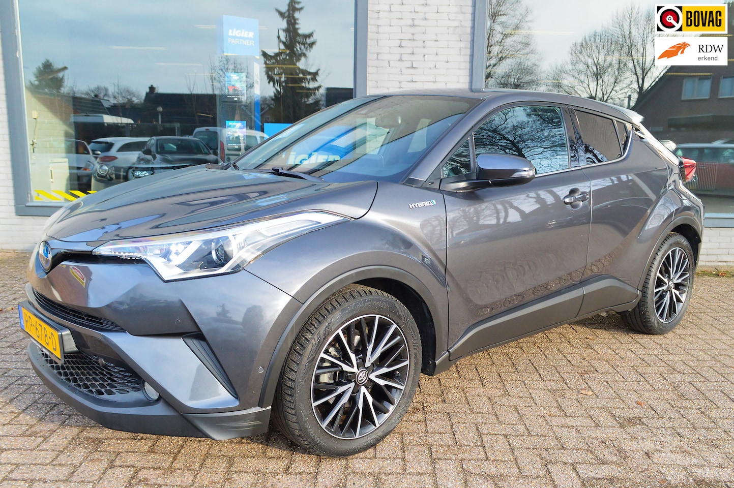 Toyota C-HR - 1.8 Hybrid Style | Verwarmde stoelen (voor)| Navigatie+ camera - AutoWereld.nl