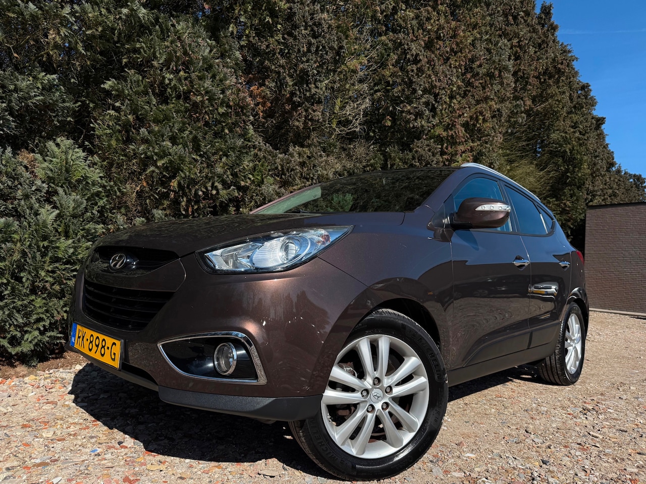 Hyundai ix35 - 2.0i 4WD | Pano | Navi | Stoelverwarming | Leder - AutoWereld.nl