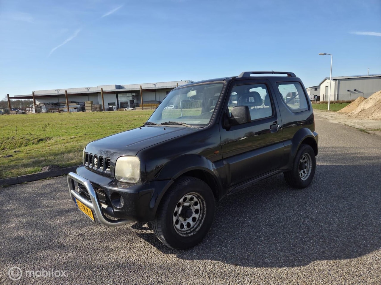 Suzuki Jimny - 1.3 JLX Automaat / Nap / 4x4 / Koppakking lek - AutoWereld.nl