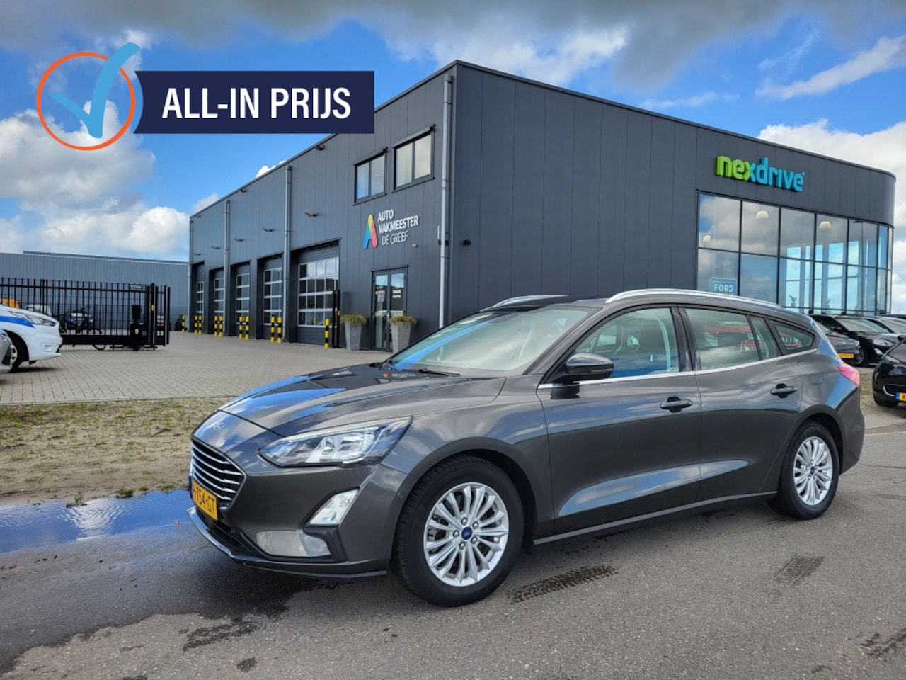 Ford Focus Wagon - 1.0 Ecoboost 125 pk Titanium Bussines Adap. Cruise / Winterpack - AutoWereld.nl