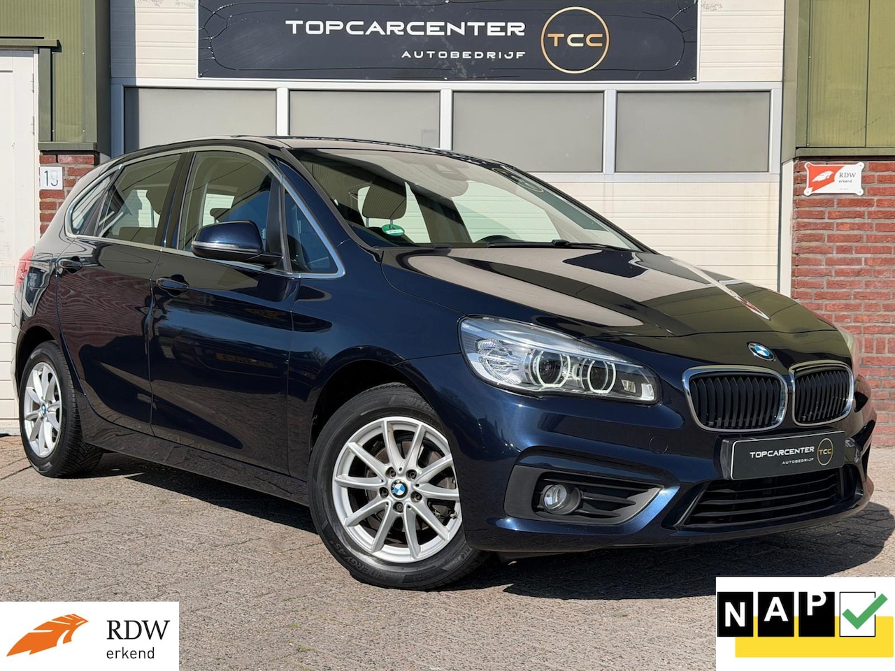 BMW 2-serie Active Tourer - 216i/NAVI/PARKS/BLUETH/APK/NAP - AutoWereld.nl