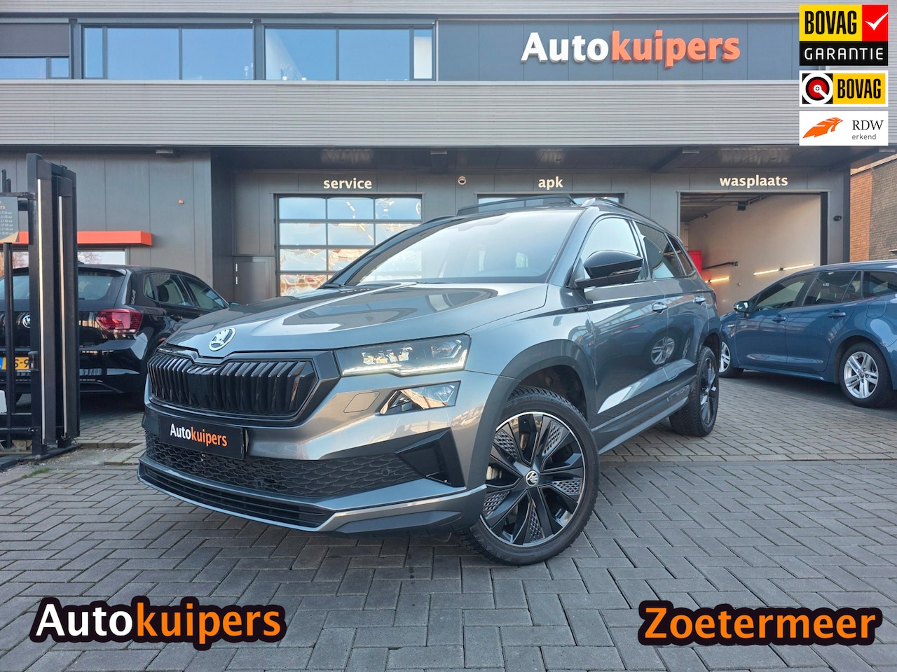 Skoda Karoq - 1.5 TSI ACT Sportline | Met o.a. panoramadak, achteruitrijcamera, AppleCarPlay/AndroidAuto - AutoWereld.nl