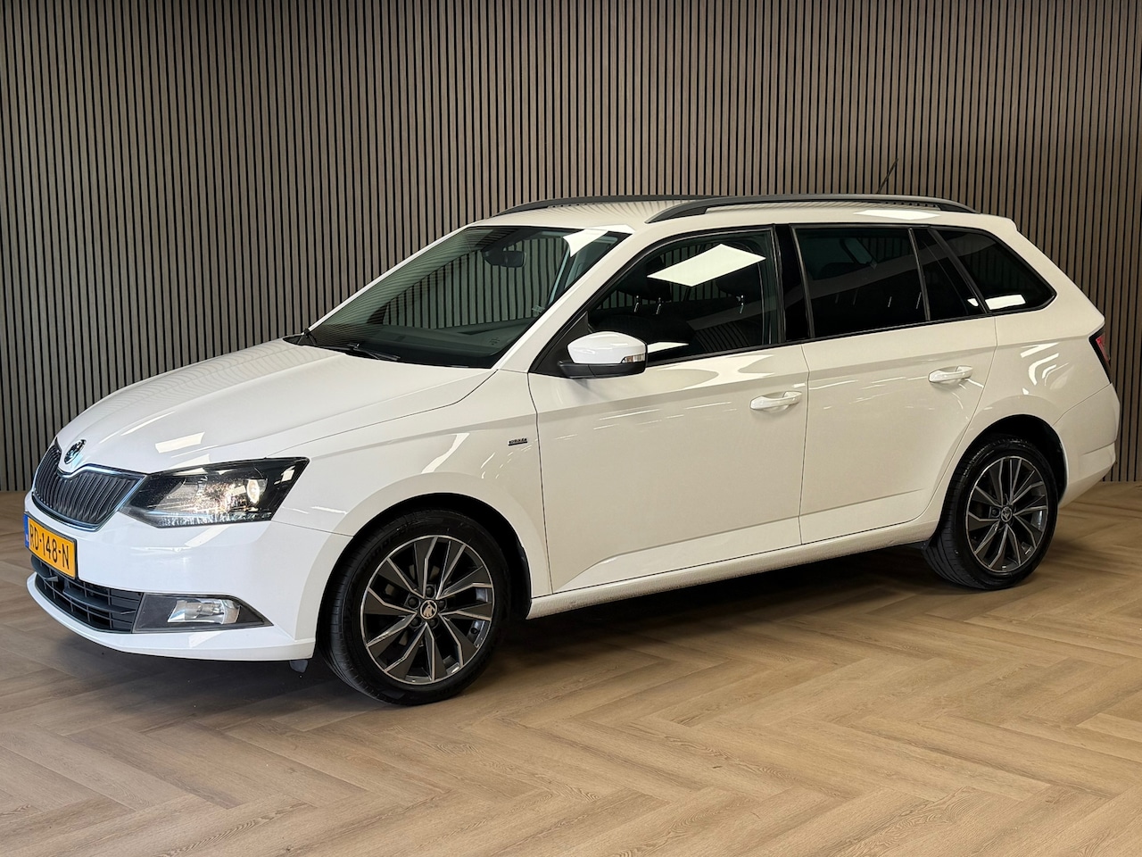 Skoda Fabia Combi - 1.0 TSI Drive NAVIGATIE CRUISE PDC AIRCO AUX USB - AutoWereld.nl