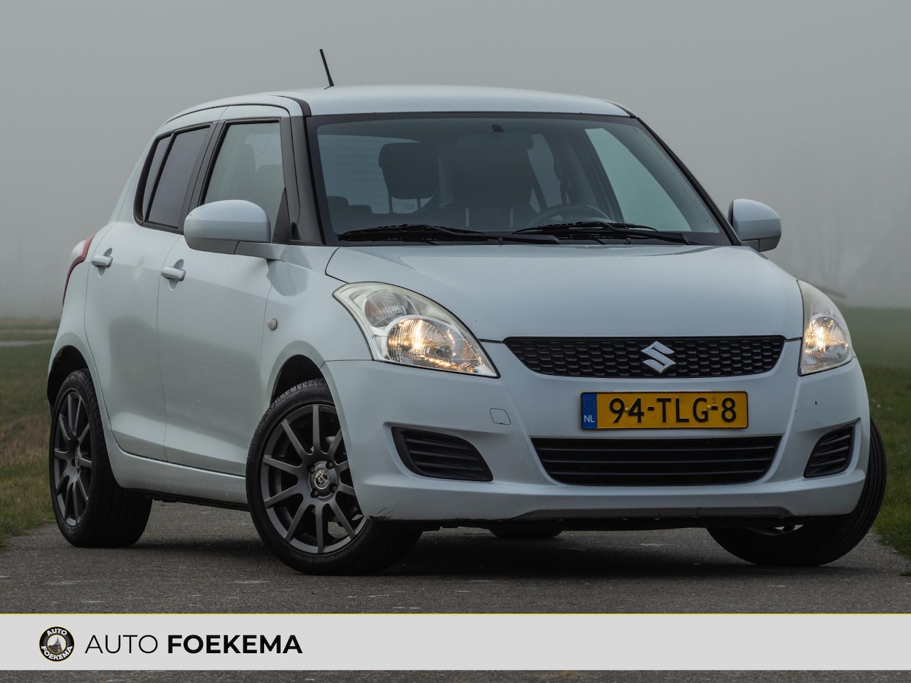 Suzuki Swift - 1.2 Comfort EASSS Cruise control Stoelverwarming - AutoWereld.nl