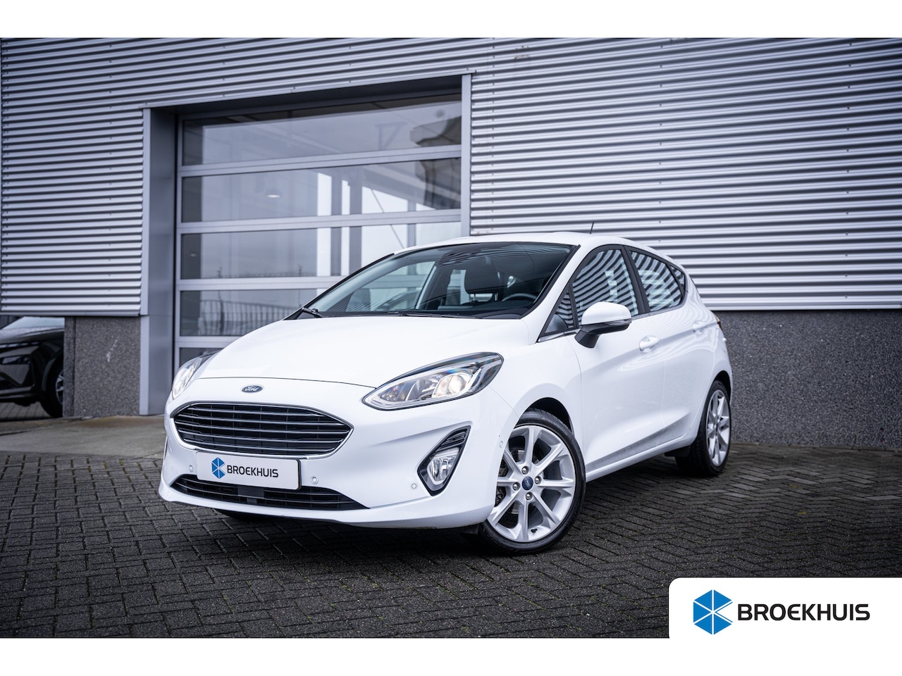 Ford Fiesta - 1.0 EcoBoost Titanium | Achteruitrijcamera | Lichtmetalen velgen 17" | Verwarmde voorruit - AutoWereld.nl