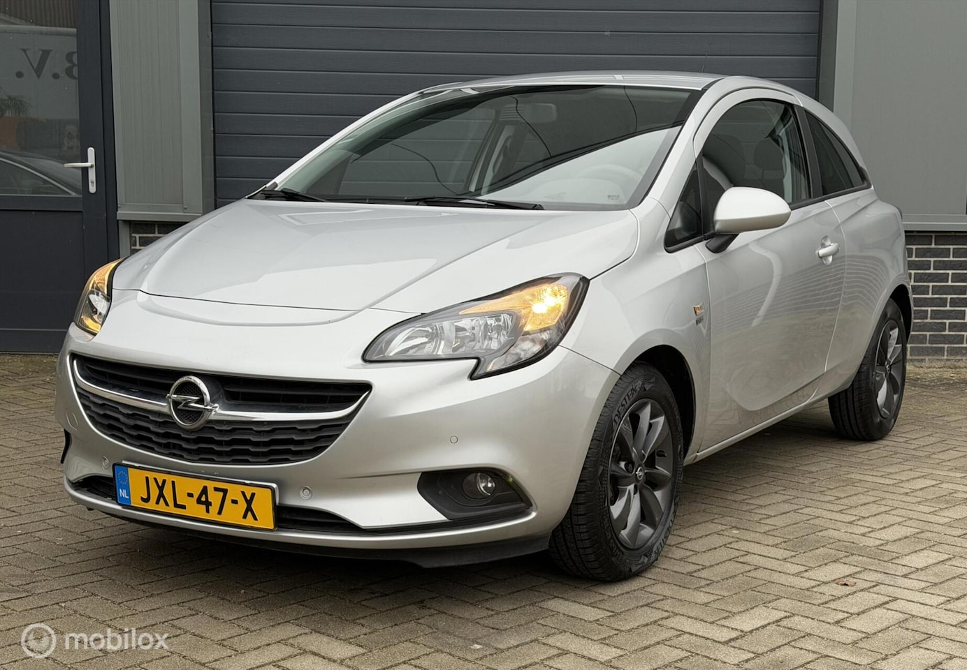 Opel Corsa - 1.4 Cosmo/ 1e EIG. AFK./ UNIEKE KM. STAND/ AIRCO - AutoWereld.nl