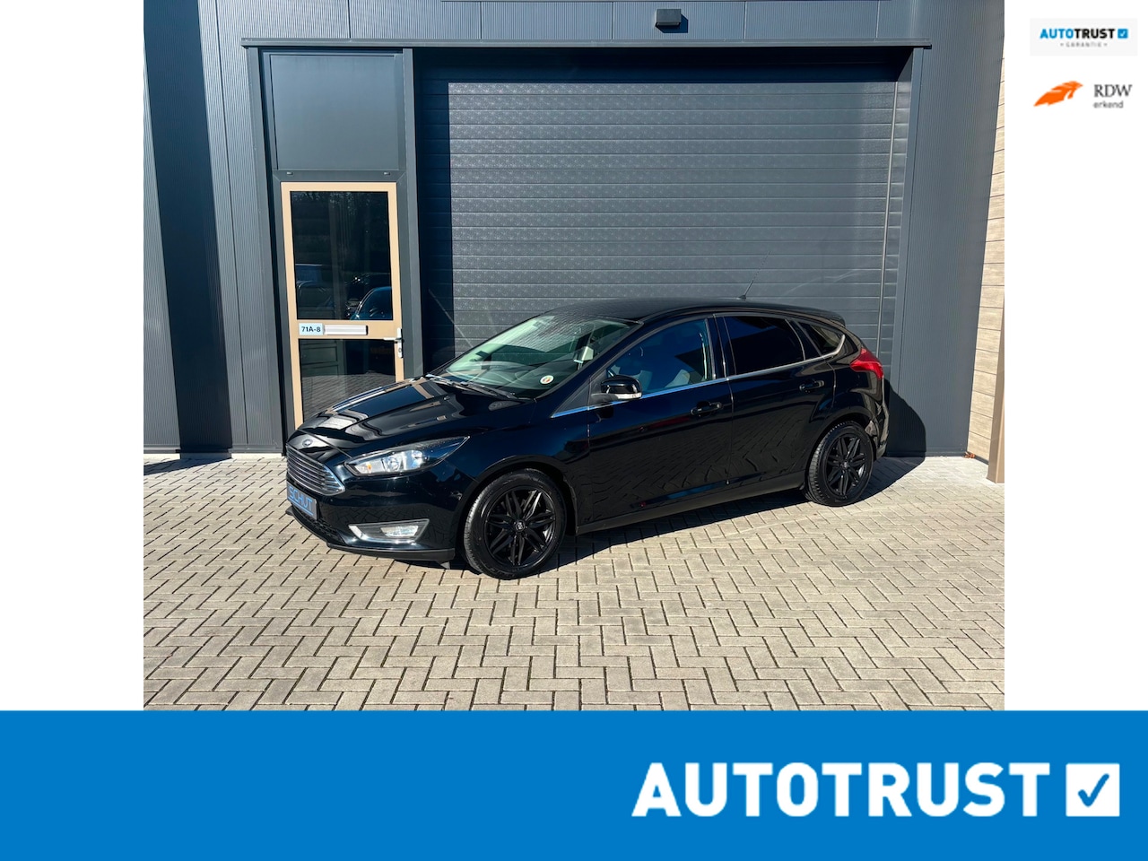 Ford Focus - 125pk Titanium BLACK | CLIMA | CRUISE CONTROL | NAVI | BLUETOOTH | STUURBEDIENING | ISOFIX - AutoWereld.nl