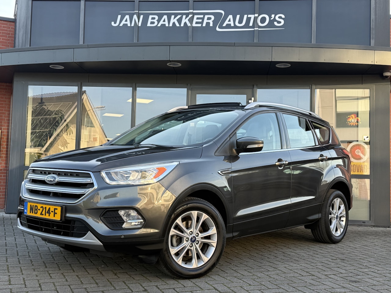 Ford Kuga - 1.5 EcoBoost Titanium ✅ Panoramadak ✅ NL-auto ✅ CarPlay ✅ - AutoWereld.nl