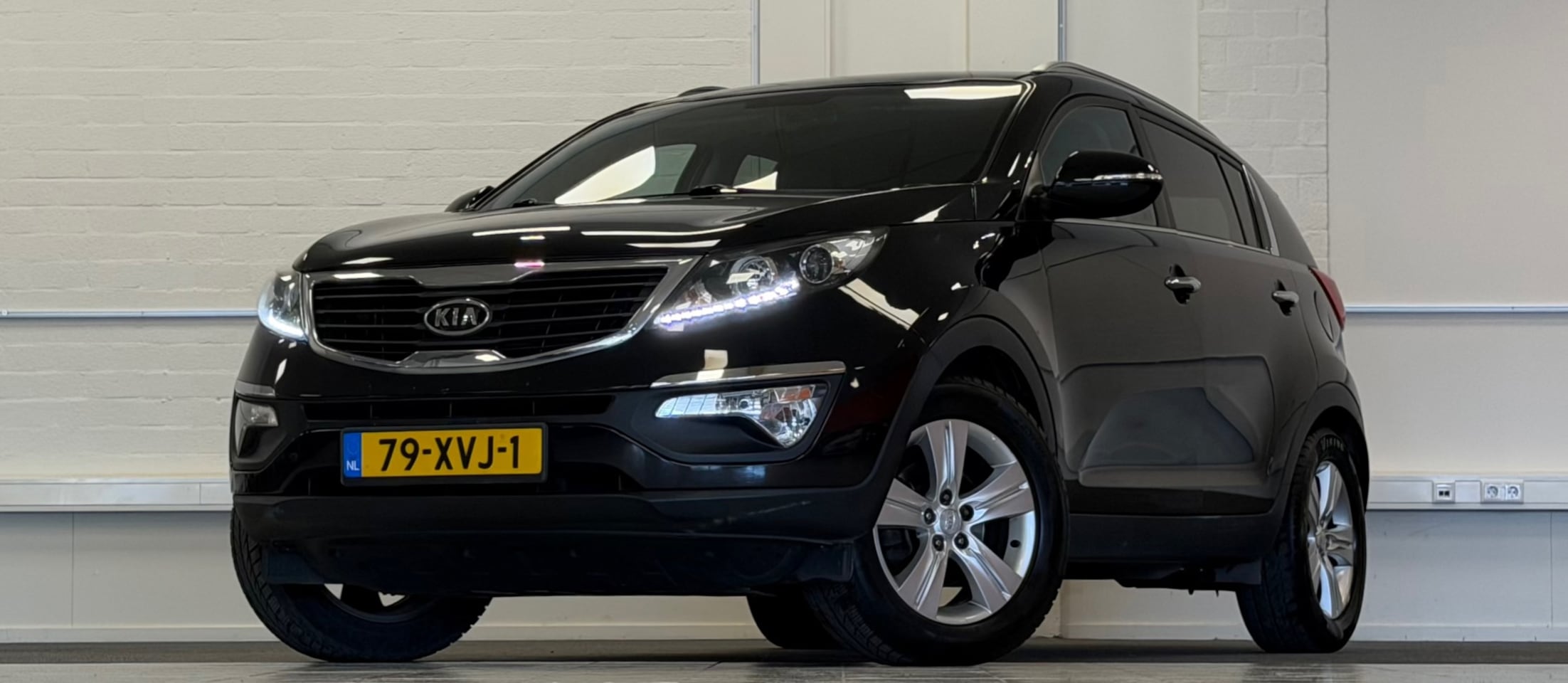 Kia Sportage - 1.6 GDI X-ecutive Plus Pack Camera Navigatie Trekhaak - AutoWereld.nl