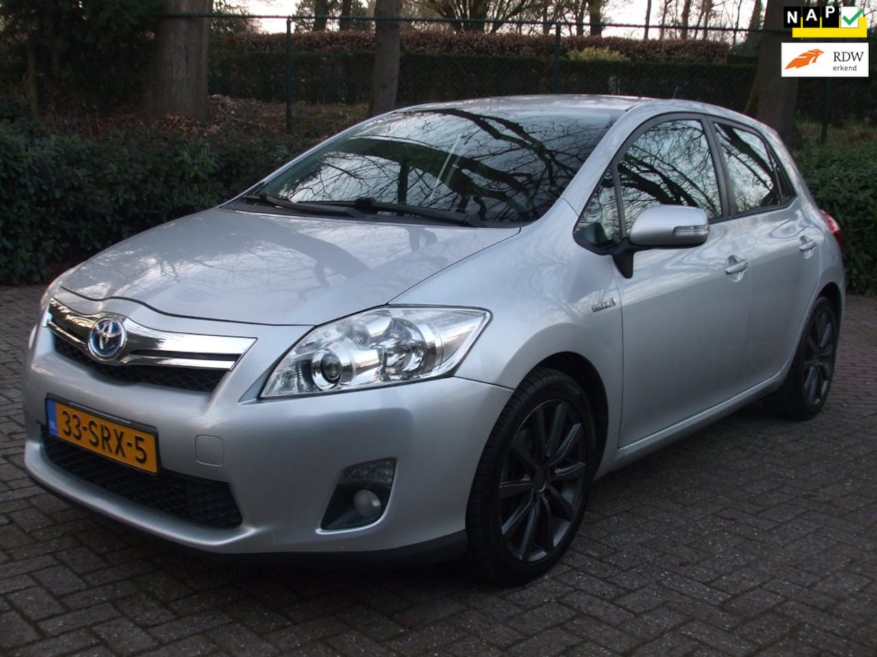 Toyota Auris - 1.8 Full Hybrid Aspiration clima cruise 164 dkm NAP - AutoWereld.nl