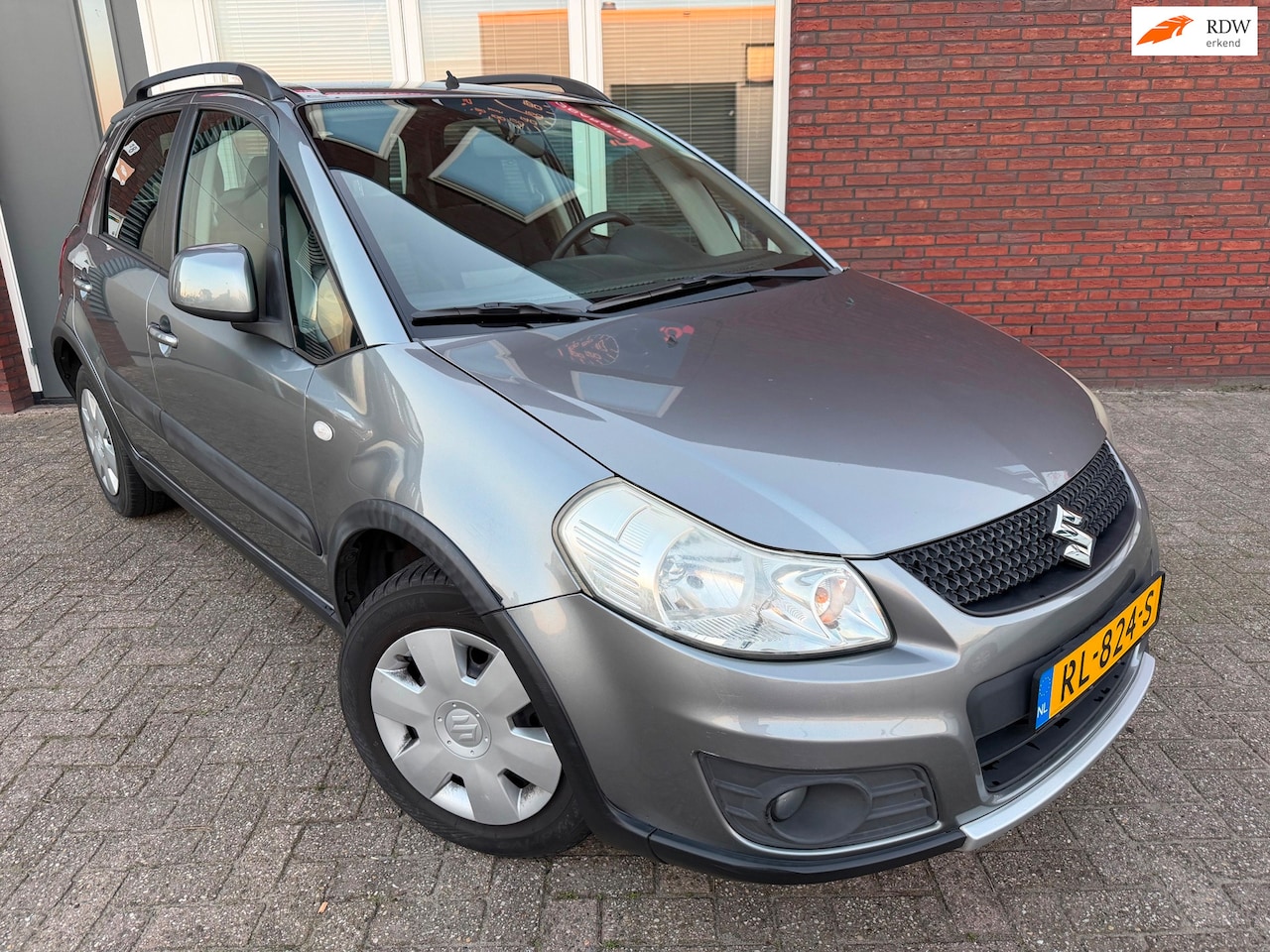 Suzuki SX4 - 1.6 Exclusive / PDC / Clima / Keyless / AUT / Stoelverwarming - AutoWereld.nl