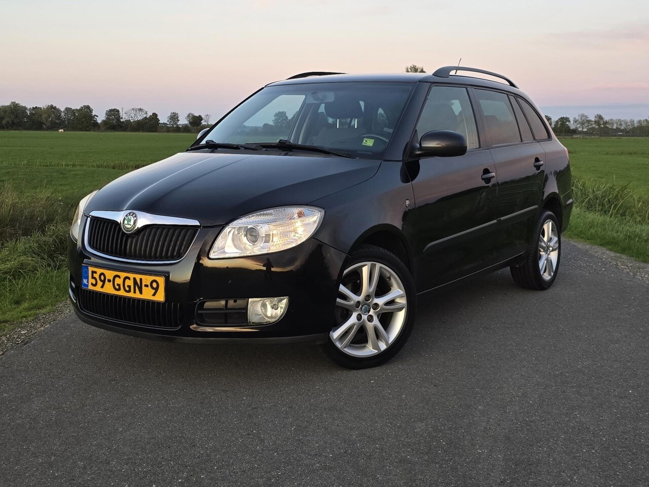 Skoda Fabia Combi - 1.6-16V Sport I Airco I Clima Control I Cruise control I Sport stoelen I Licht metalen vel - AutoWereld.nl