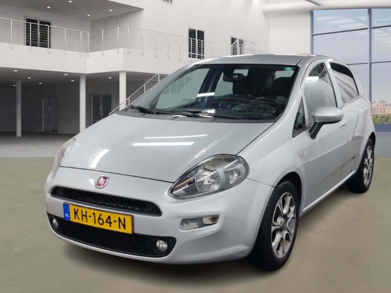 Fiat Punto Evo - 0.9 TwinAir Lounge/ ZEER ZUINIG/ LAAG KM - AutoWereld.nl