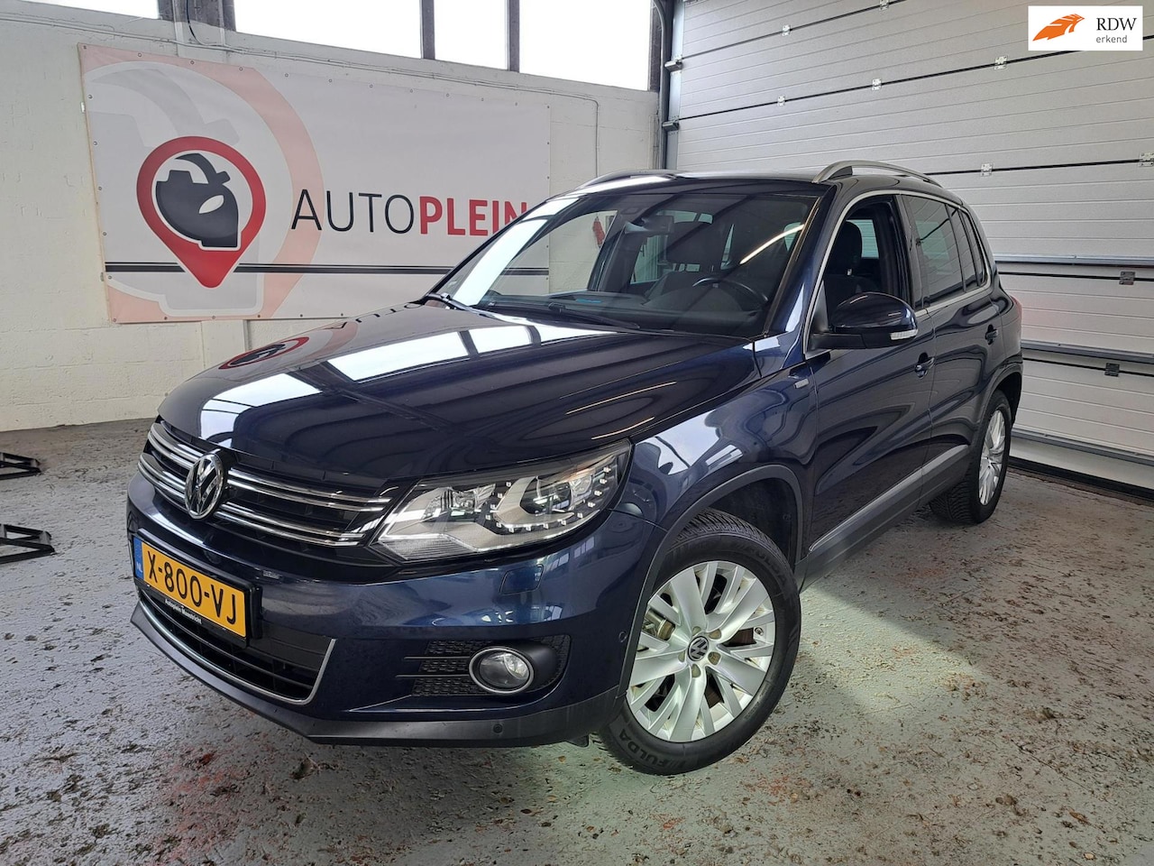 Volkswagen Tiguan - 1.4 TSI Sport&Style - AutoWereld.nl