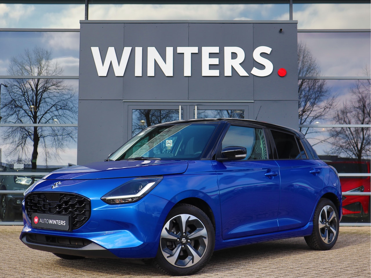 Suzuki Swift - 1.2 Style Smart Hybrid Navigatie | Climate Control | Stoelverwarming | All-Seasons | 10 ja - AutoWereld.nl