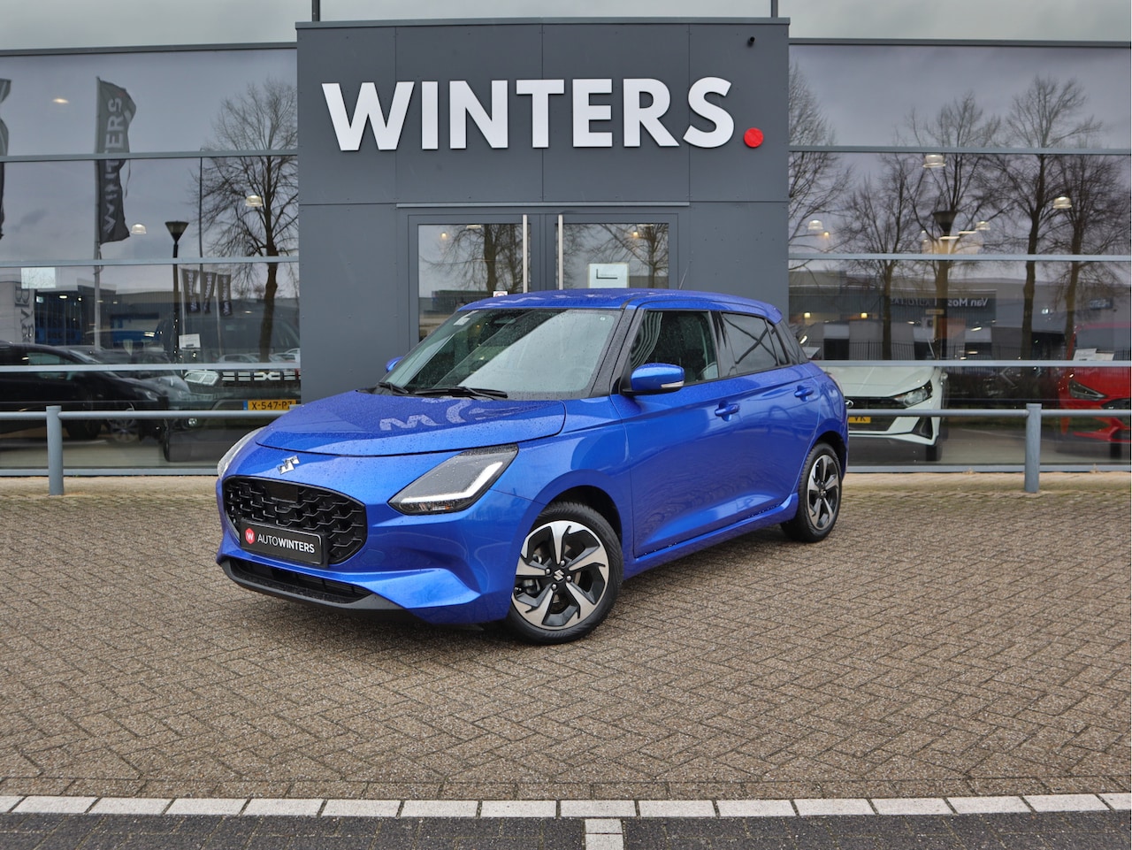 Suzuki Swift - 1.2 Style Smart Hybrid CVT Automaat | Navigatie | Camera | Stoelverwarming | All seasons | - AutoWereld.nl