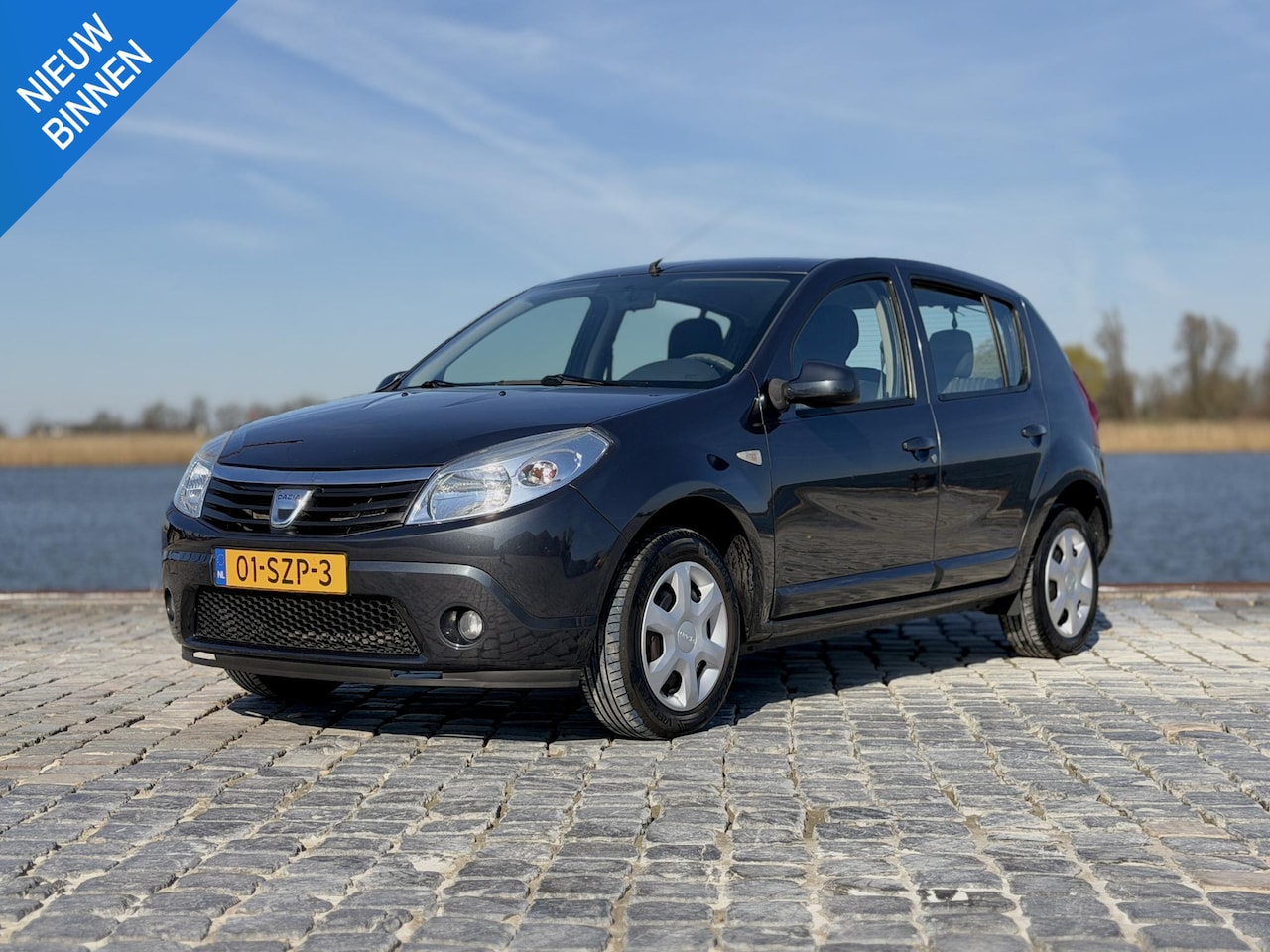 Dacia Sandero - 1.2 Lauréate|Airco|Trekhaak|D-riem vervangen - AutoWereld.nl