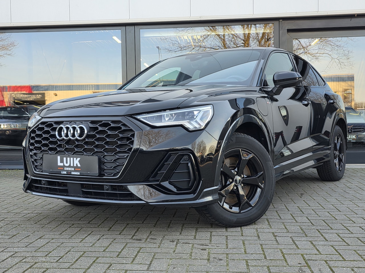 Audi Q3 Sportback - 45 TFSI e S Edition + S-LINE + BLACK OPTIC + CAMERA + 2x WIELEN - AutoWereld.nl