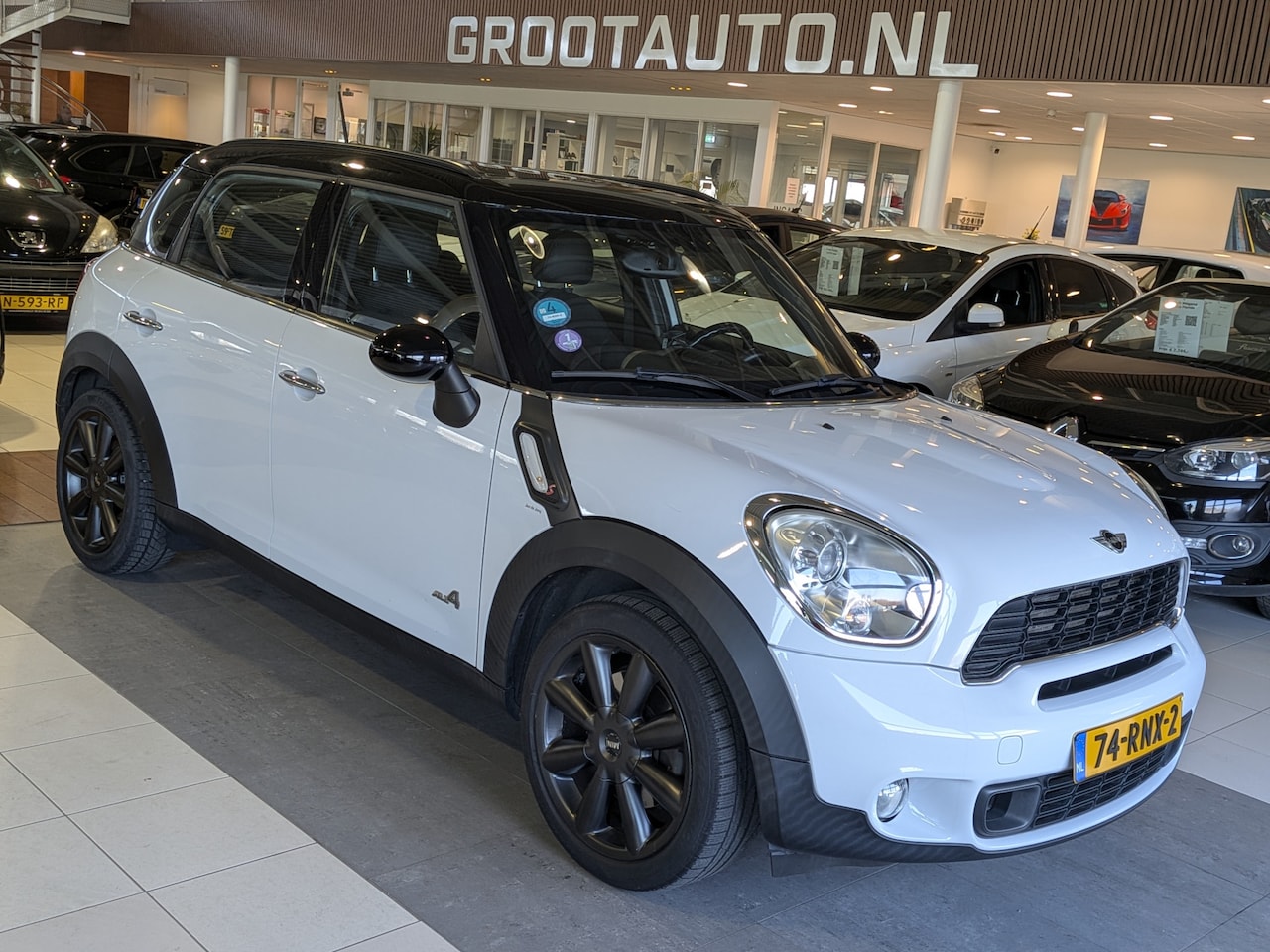 MINI Countryman - Mini 1.6 Cooper S ALL4 Chili Panoramadak, Airco, Cruise Control, Trekhaak, Stuurbekrachtig - AutoWereld.nl