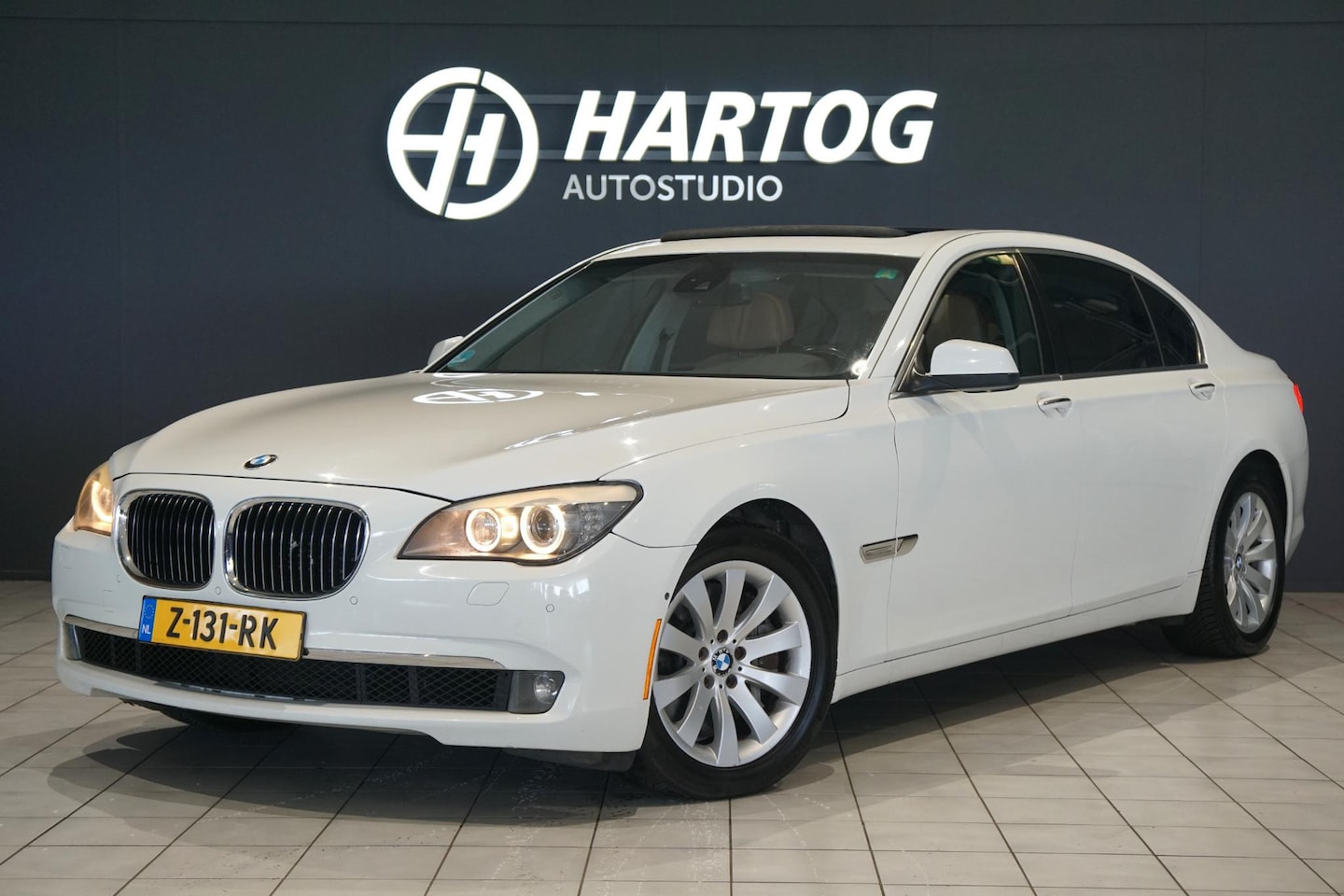 BMW 7-serie - 750Li *MOTORSCHADE* + SOFT CLOSE / SCHUIFDAK / XENON / MEMORY - AutoWereld.nl