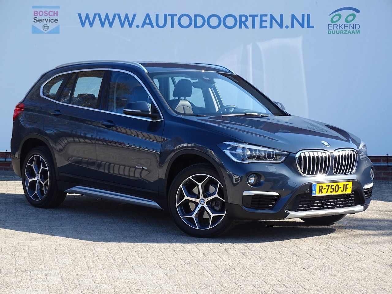 BMW X1 - SDrive18i High Executive|CAM|NAV|STOELVERWARMING - AutoWereld.nl