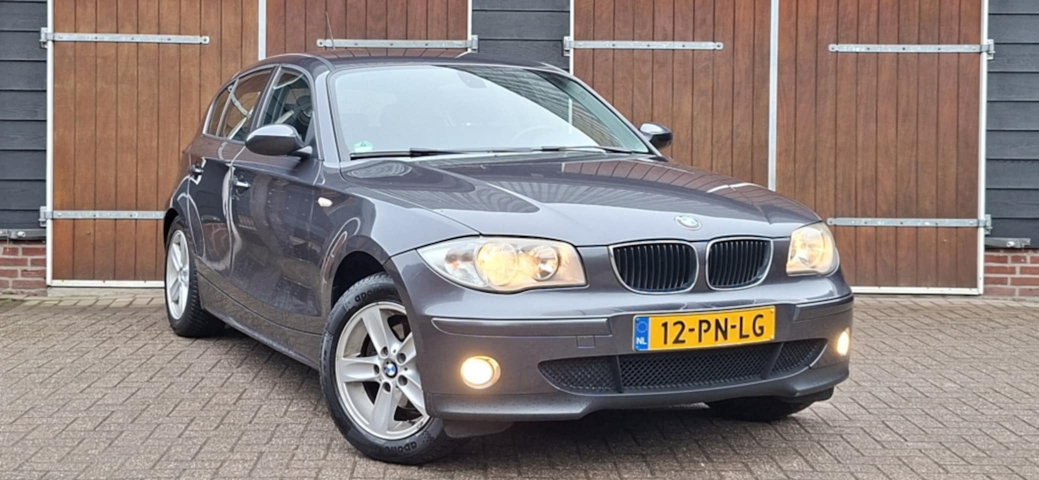BMW 1-serie - 116i High Executive 116i High Executive, 5 Deurs, Cruise control, NAP - AutoWereld.nl