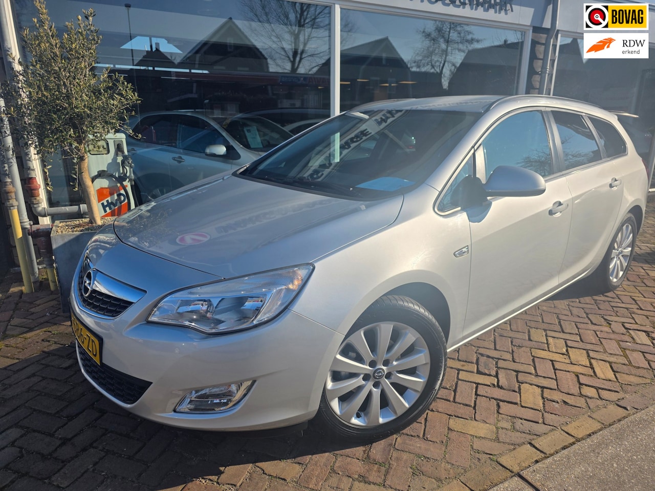 Opel Astra Sports Tourer - 1.4 Edition 1.4 Edition,17inch velgen,goed onderhouden - AutoWereld.nl