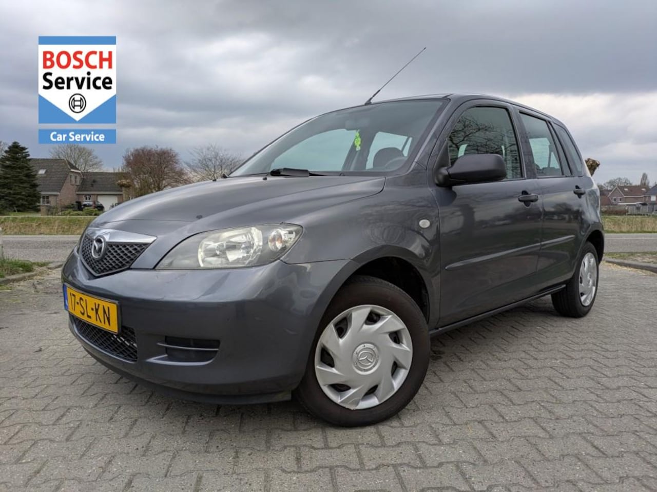 Mazda 2 - 1.2 EXCLUSIVE I Airco I Cruise I Trekhaak - AutoWereld.nl