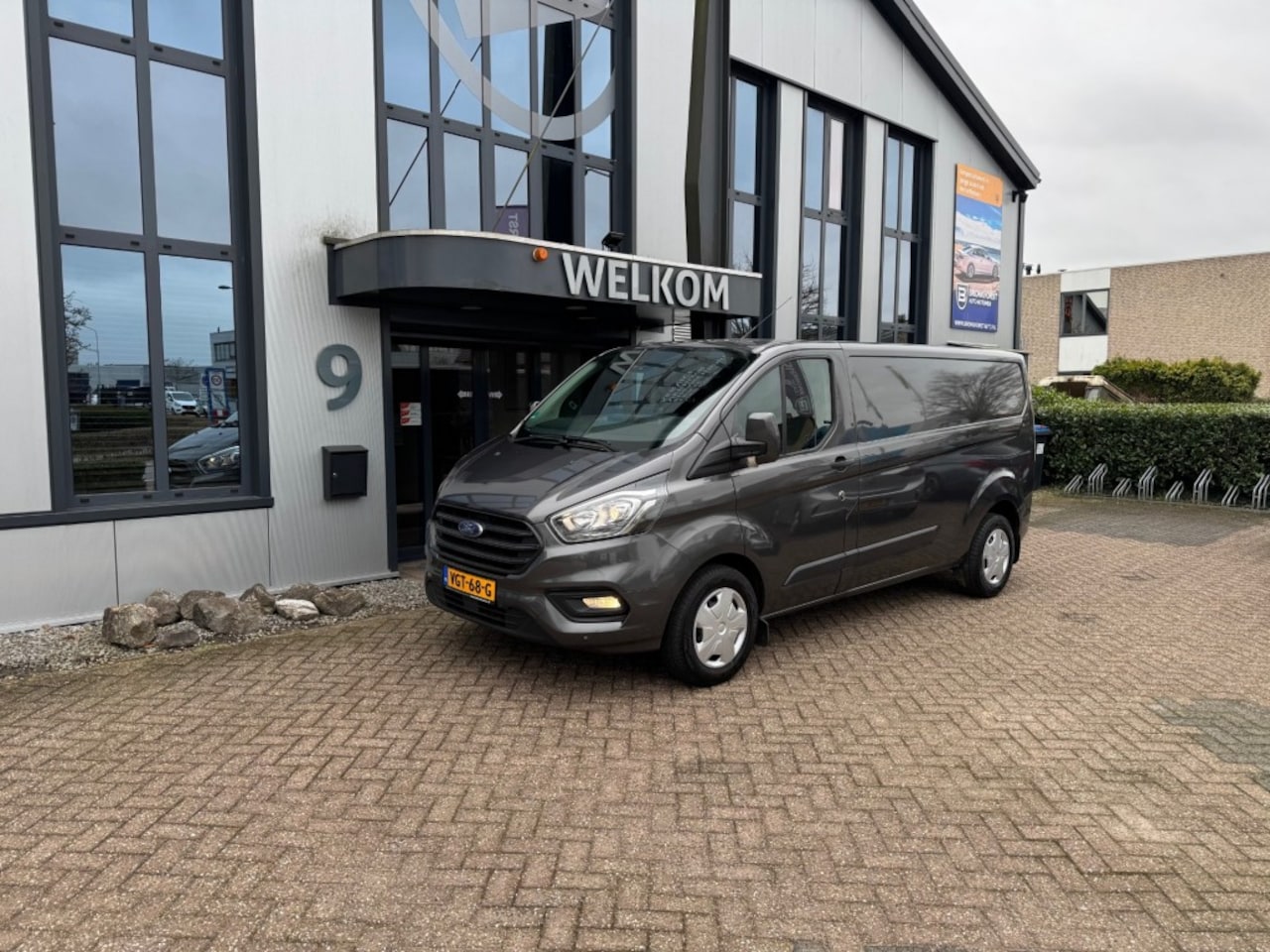 Ford Transit Custom - 2.0 TDI L2 Automaat, 130PK, Airco, Navi, PDC, Schuifdeur, Licht- en zichtpakket - AutoWereld.nl