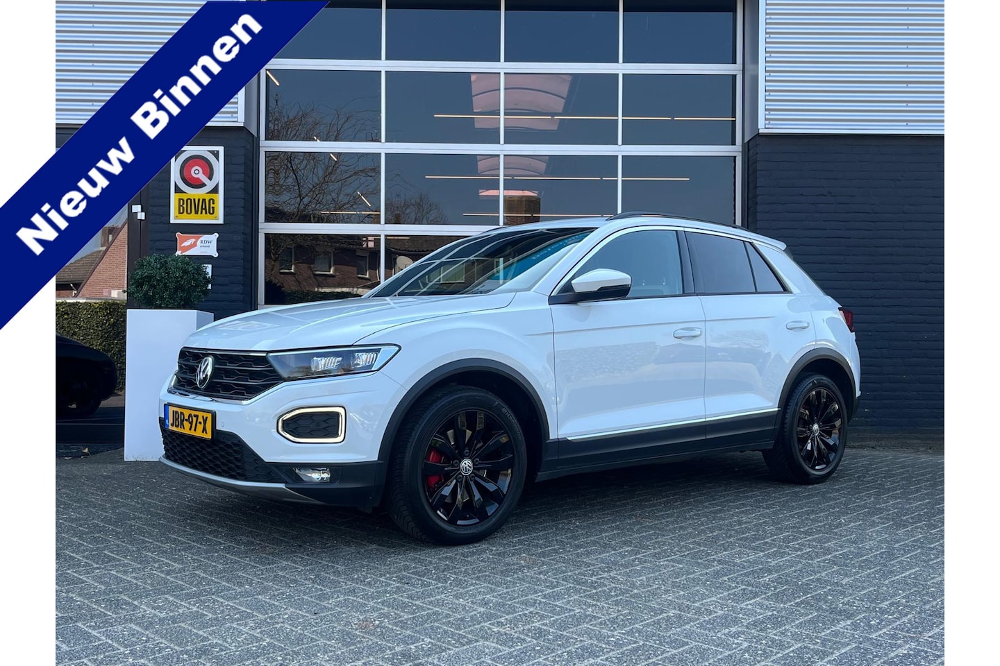 Volkswagen T-Roc - 1.5 TSI Sport 1.5 TSI Sport, Automaat, CarPlay, Camera, Cruise, Navi, PDC - AutoWereld.nl