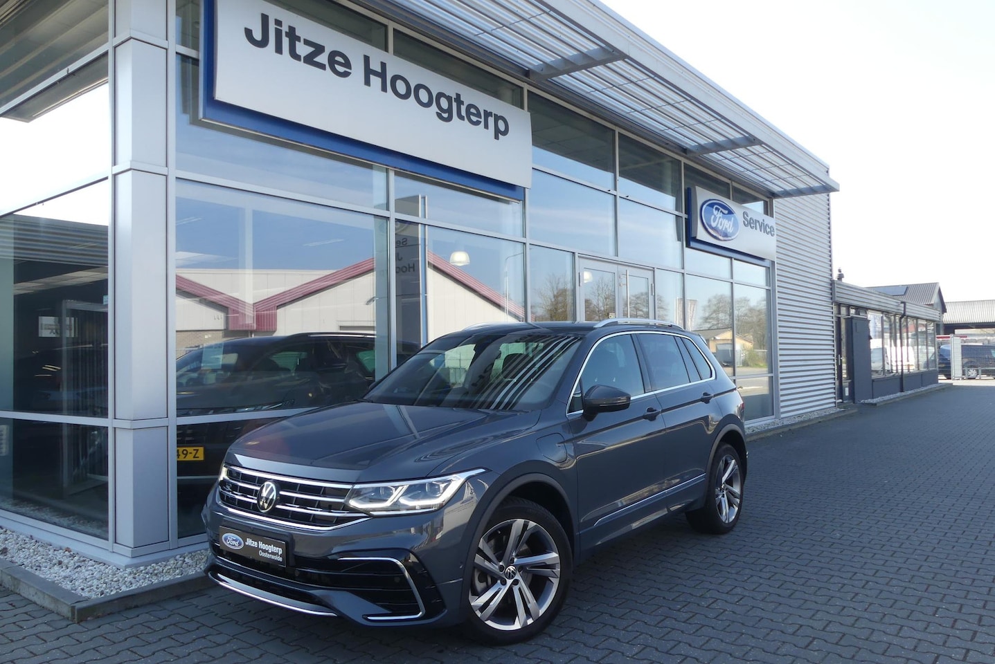 Volkswagen Tiguan - 1.4 TSI eHybrid R-Line Business+ 360° CAMERA, ADAPT. CRUISE, CLIMA, NAVI, PDC V&A, APPLE C - AutoWereld.nl