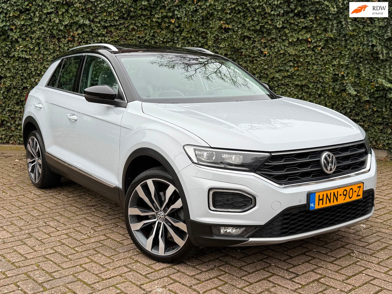 Volkswagen T-Roc - 2.0 TSI 4Motion Sport | Pano | Leder | Trekhaak - AutoWereld.nl