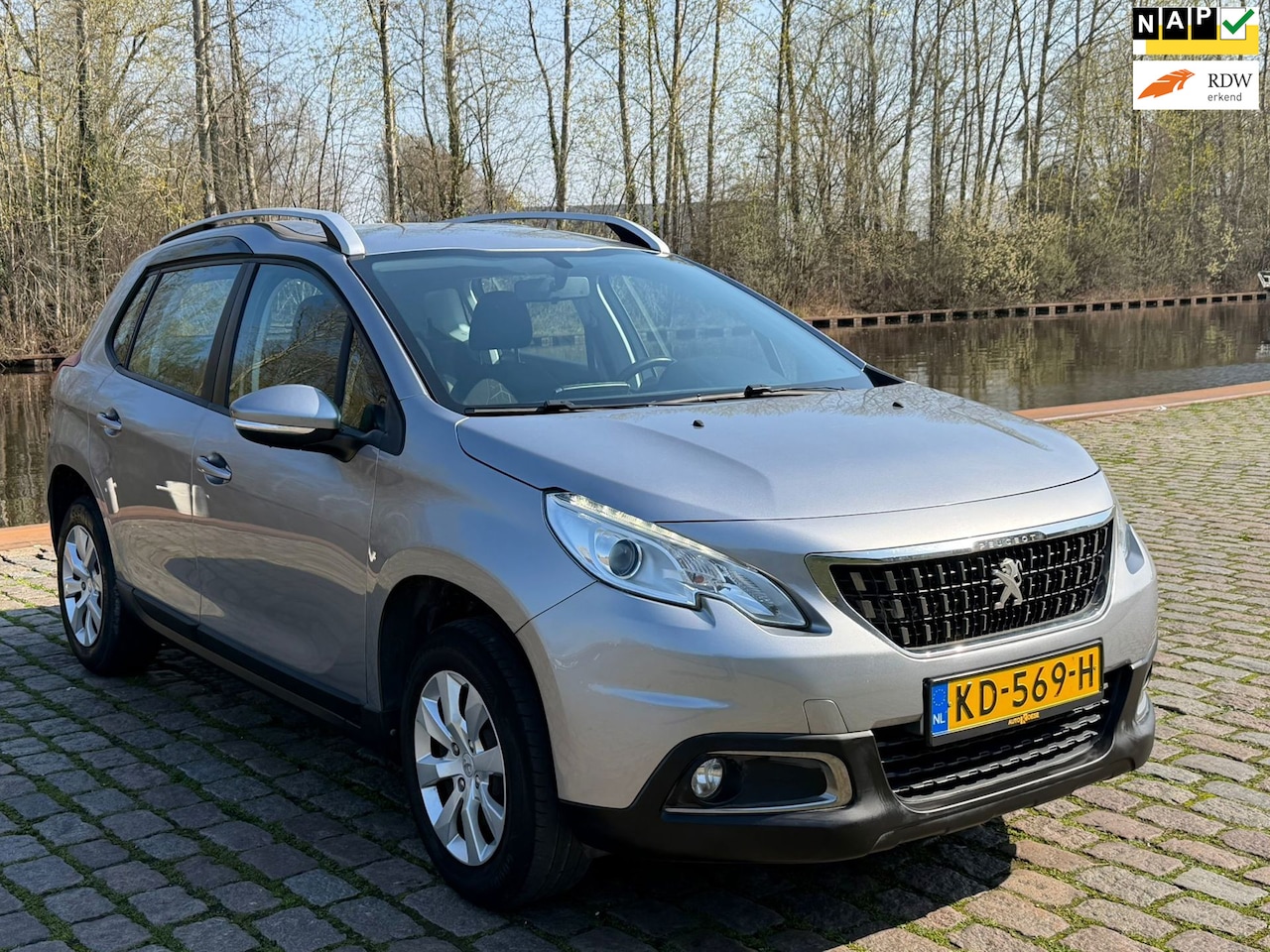 Peugeot 2008 - 1.2 PureTech Blue Lion Dealer onderhouden trekhaak navigatie airco cruis control cv op afs - AutoWereld.nl