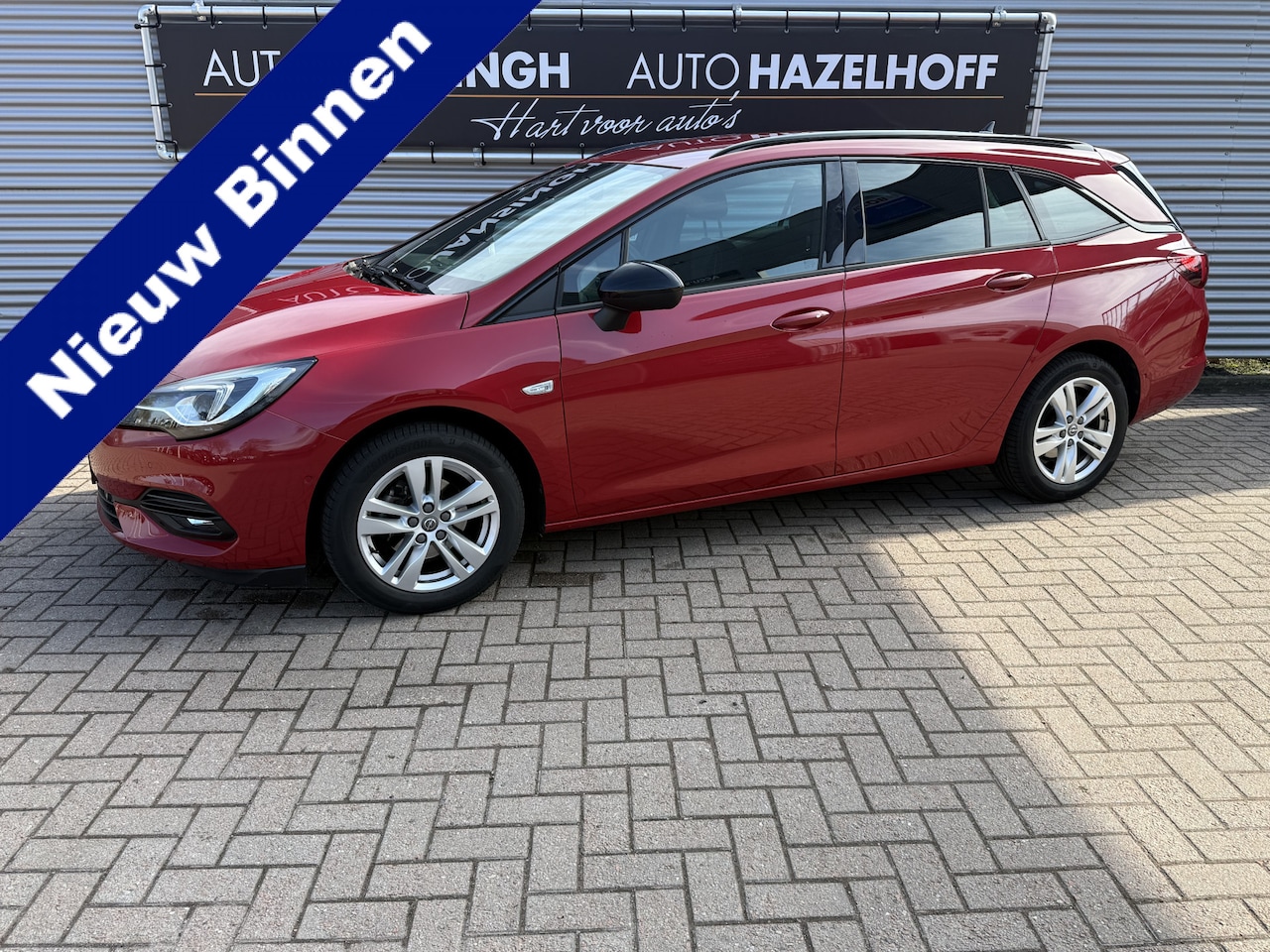 Opel Astra Sports Tourer - 1.2 Blitz Elegance | Camera | Trekhaak | PDC V+A | Dodehoek detectie | Privacy Glas | LED - AutoWereld.nl