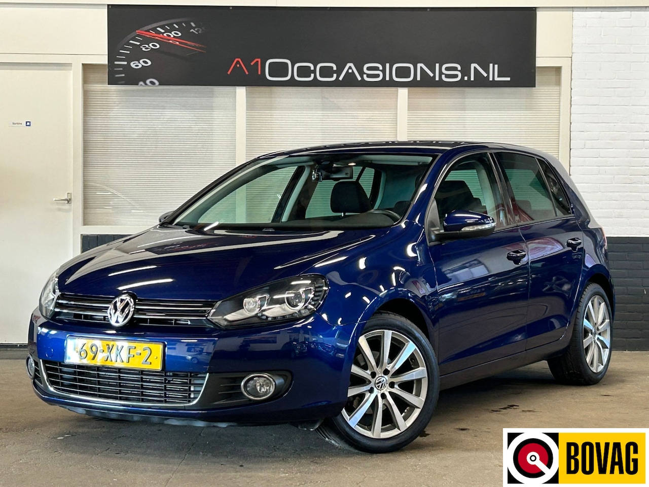 Volkswagen Golf - 1.2 TSI Highline BlueMotion + AUTOMAAT - AutoWereld.nl