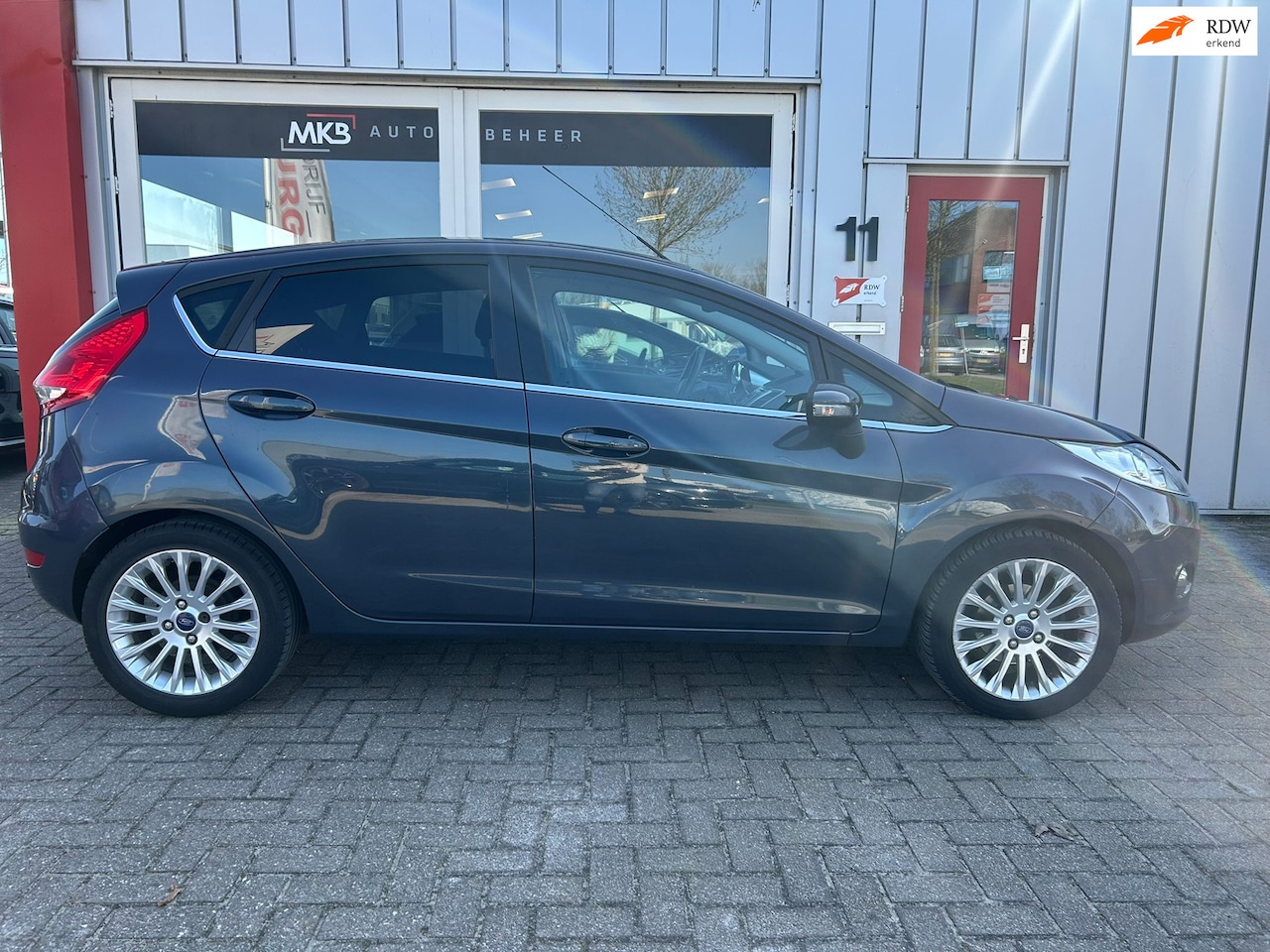 Ford Fiesta - 1.25 Titanium 5 Deurs/Airco/ECC/Dealer OH - AutoWereld.nl
