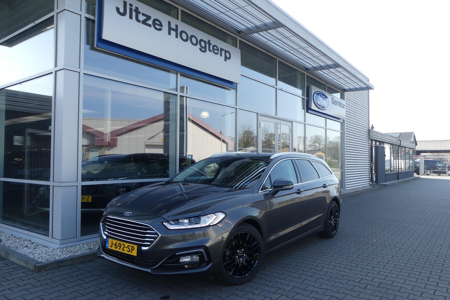 Ford Mondeo Wagon - 2.0 IVCT HEV Titanium 18 INCH, ELEKT. TREKHAAK (750KG), WINTER PACK, MEMORY, CRUISE, CLIMA - AutoWereld.nl