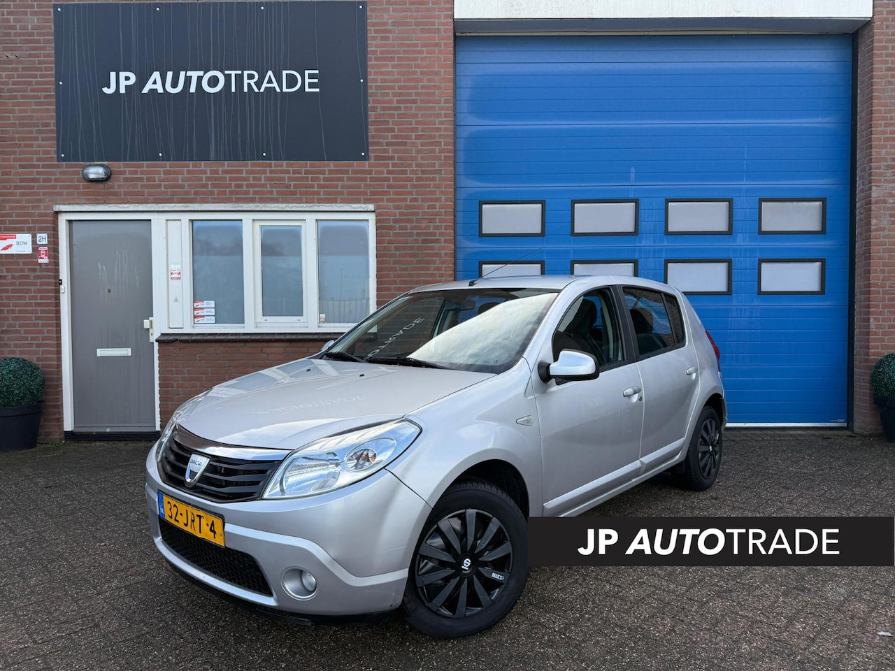 Dacia Sandero - 1.2 Lauréate | Airco | Elektr ramen | Radio - AutoWereld.nl