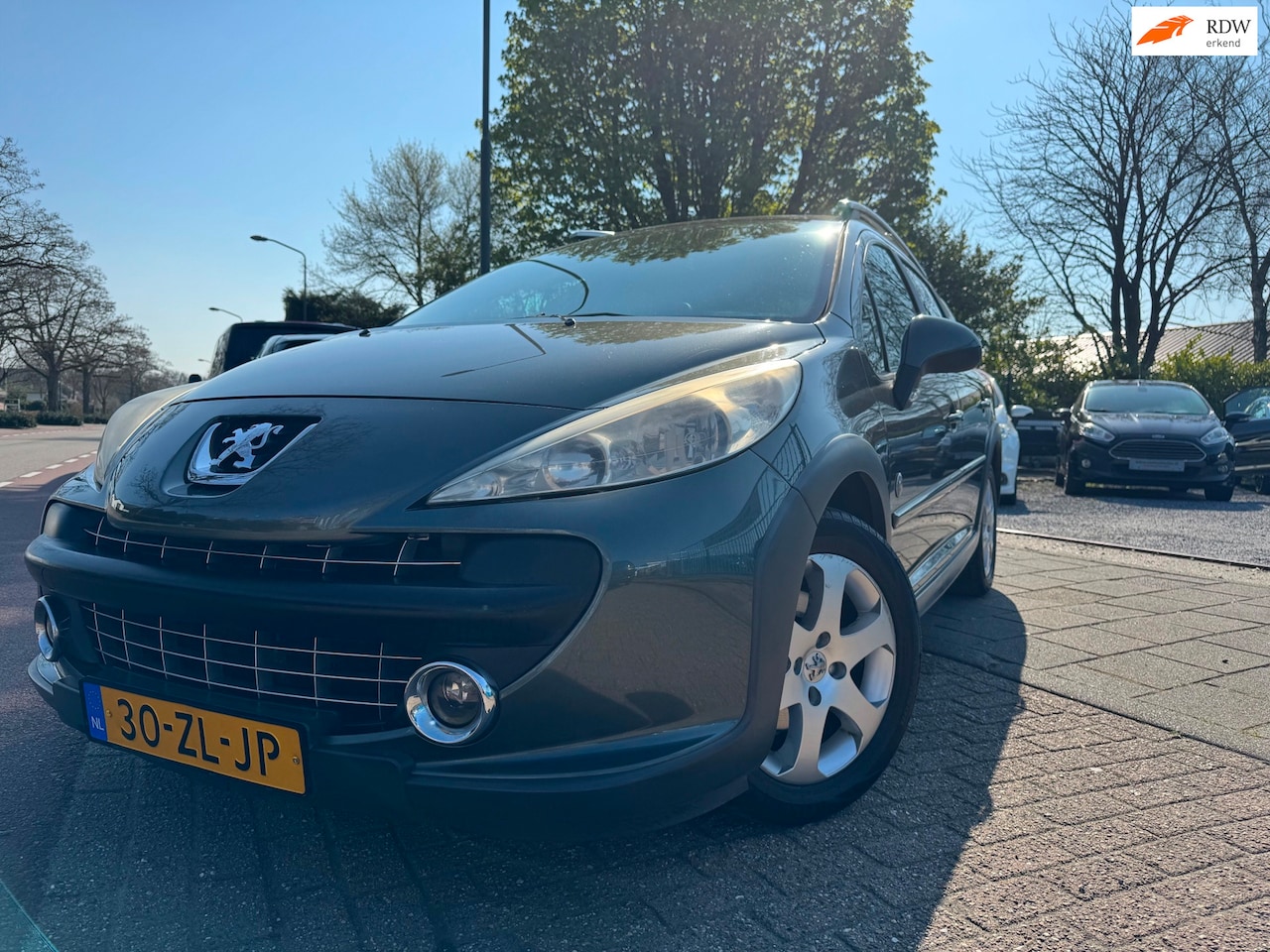 Peugeot 207 SW Outdoor - 1.6 VTi XS A-C Elek Pakket Pano Lmv - AutoWereld.nl