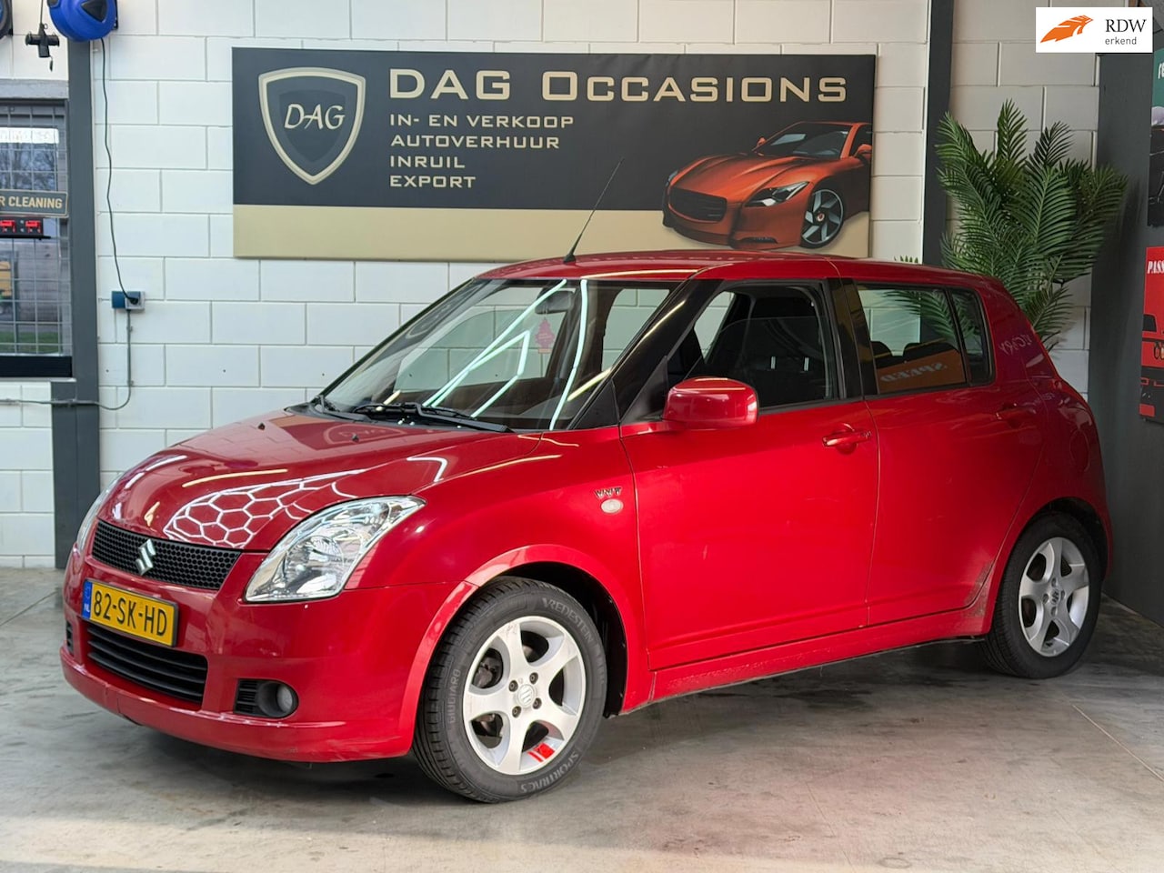 Suzuki Swift - 1.5 Exclusive AIRCO|TREKHAAK|ELEKTRISCHE RAMEN - AutoWereld.nl